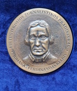Johano Ferdinando Kelkio, lietuviškosios žurnalistikos pradininko (1801-1877), medalis. LŽS Klaipėdos apskrities skyriaus archyvo nuotrauka Johano Ferdinando Kelkio, lietuviškosios žurnalistikos pradininko (1801-1877), medalis. LŽS Klaipėdos apskrities skyriaus archyvo nuotrauka